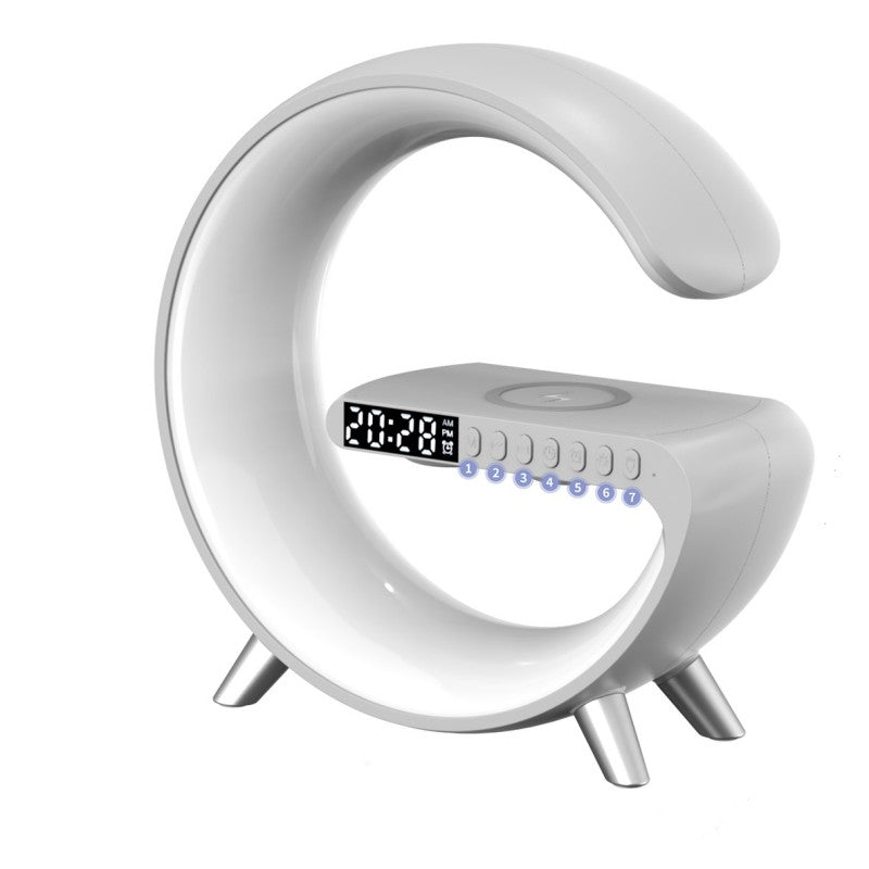 White G-shaped LED lamp with digital clock and wireless charging pad