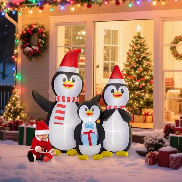 6 ft Christmas inflatable penguin family with LED lights in a front yard