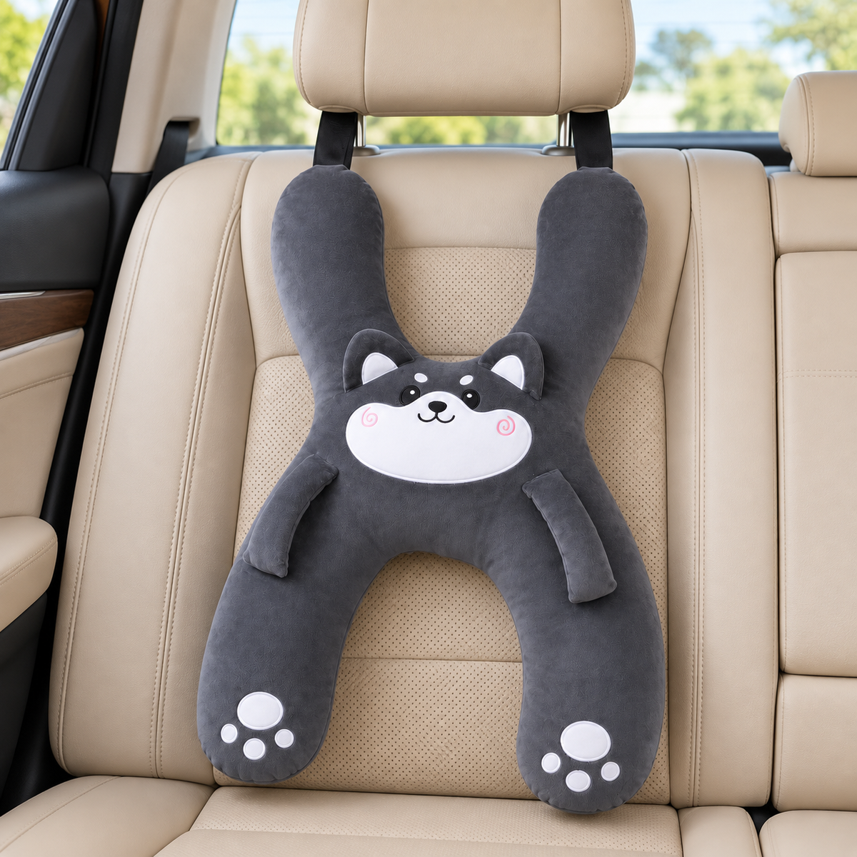 Grey Husky travel pillow displayed by itself on a vehicle seat